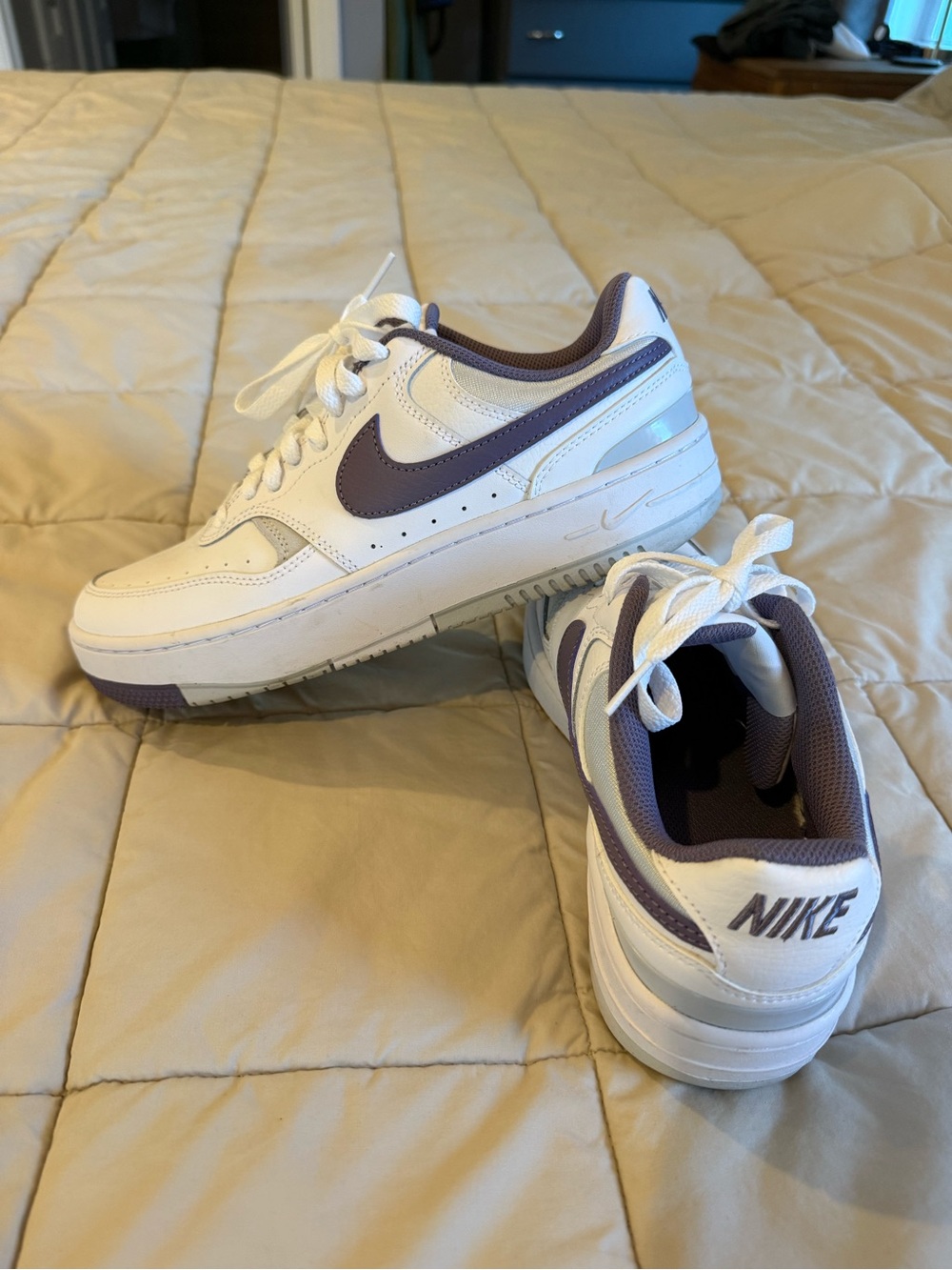 Nike White Sneakers with Purple Swoosh